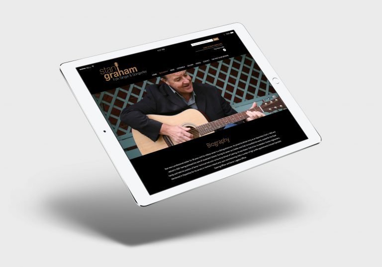 An ipad showing the home page design for Stan Graham, singer songwriter's website